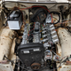 Fitting the new 850-sourced engine in the engine bay.